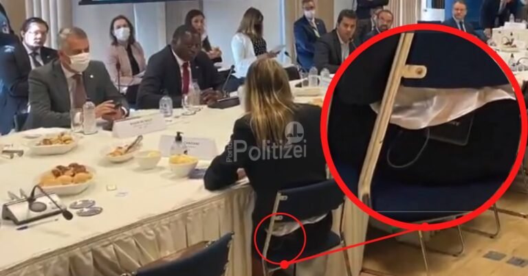 Luíza Canziani portando microfone da globo em reunião com ministro da educação